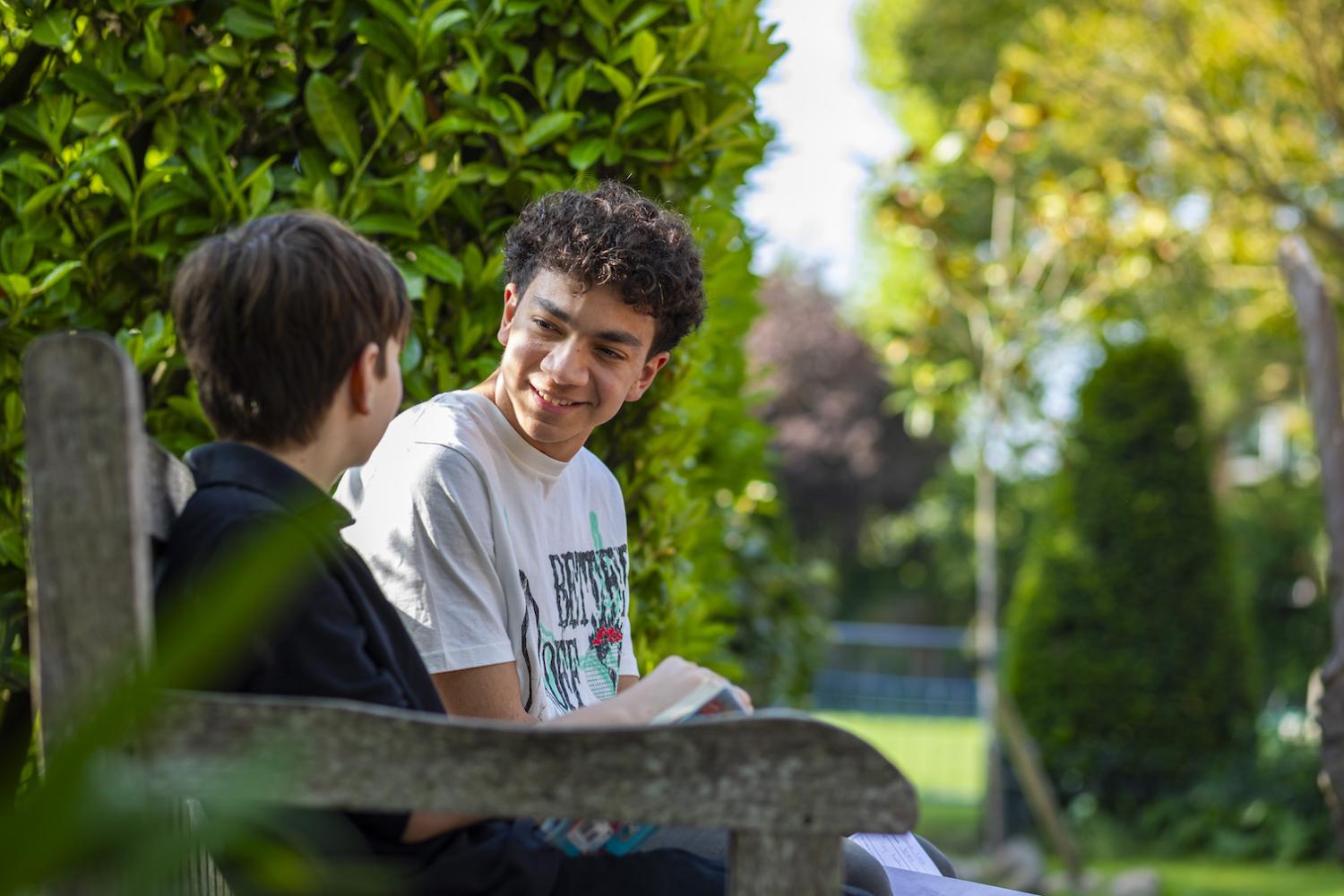 Ahmet, Harroidian Sixth Former with his reading buddy
