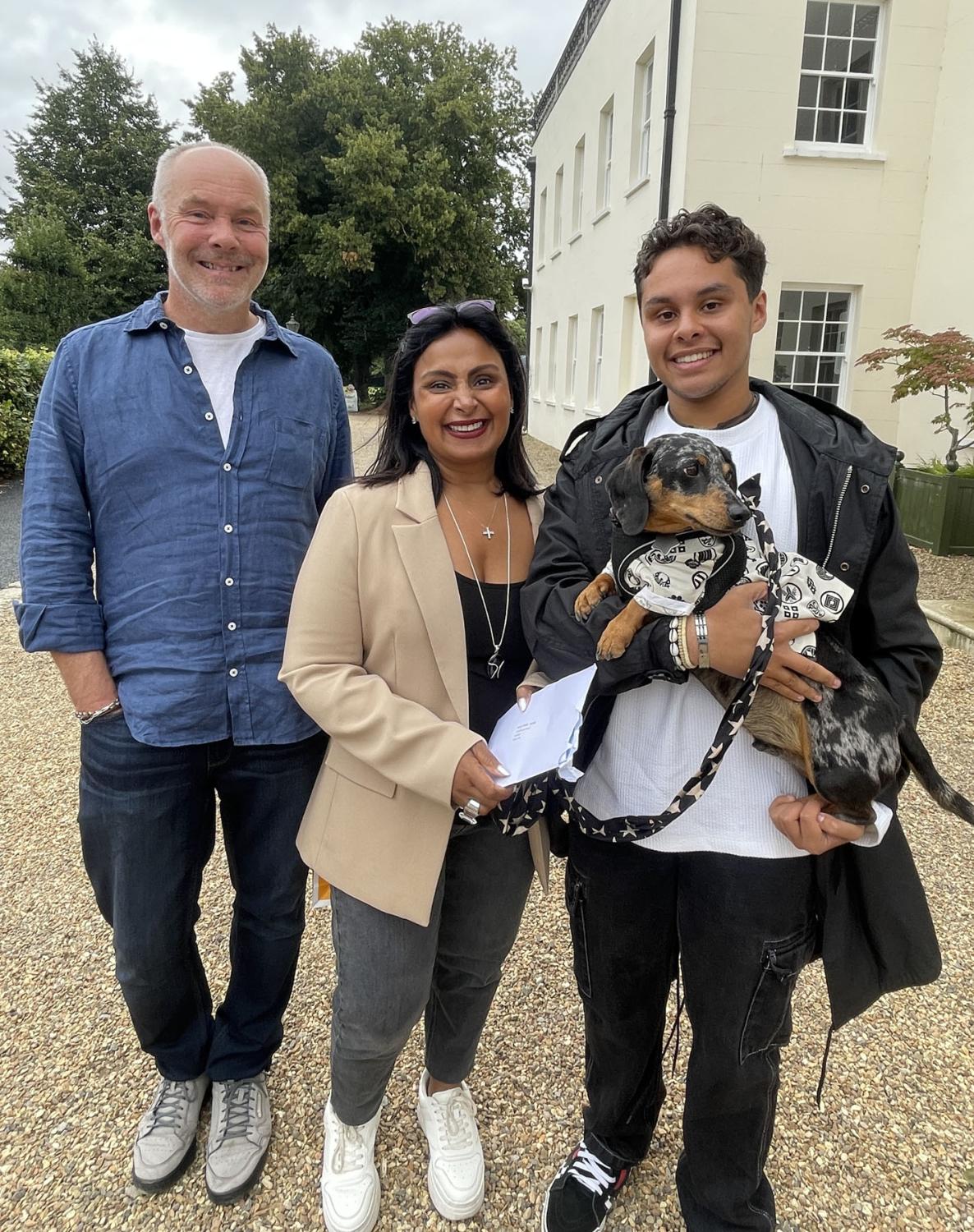 Arun with his parents and dog