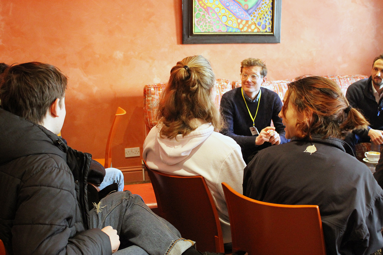 Dr%20Nick%20talking%20to%20kids%20in%20cafe.jpg