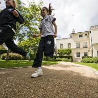Kids running in prep garden